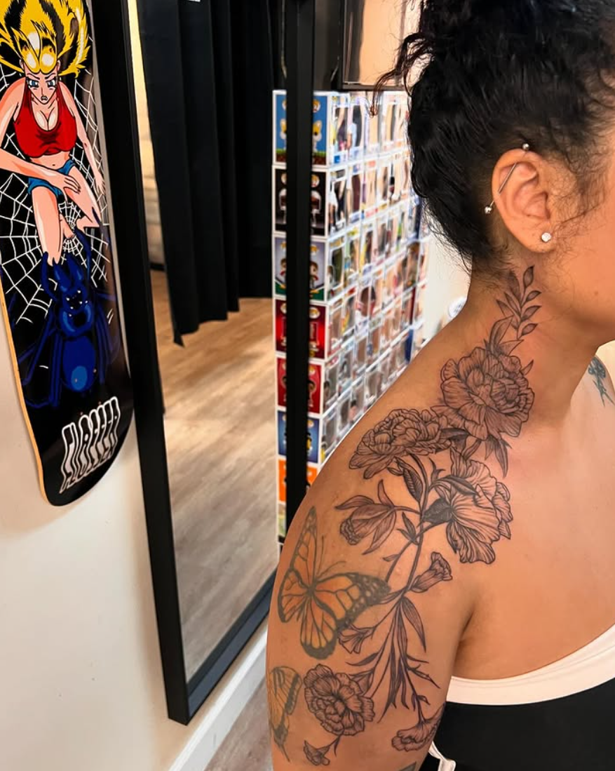 Floral neck back tattoo